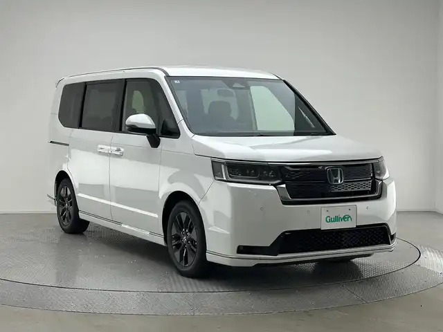 ホンダ ステップワゴン スパーダ eHEV 兵庫県 2025(令7)年 0.1万km未満 パール 純正11.4インチメモリナビHonda CONNECTナビ/ LXM-247VFLi/登録済未使用車　　/バックカメラ　　/パドルシフト　/ブラインドスポットモニター　/ＬＫＡ　/プリクラッシュセーフティー　/パワーバックドア　/オットマン　/ハーフレザーシート　/シートヒーター/スペアキー/LEDヘッドライト/LEDフォグランプ/純正16インチアルミホイール/ヘッドライトレベライザー