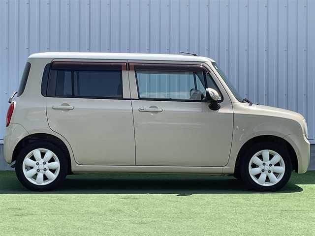 スズキ ラパン X 香川県 2009(平21)年 3.9万km ミルクティーベージュメタリック/スペリアホワイト 登録時走行距離：38774km/クラリオン製HDDナビ/　CD　MSV/レベライザヘッドライト/ベンチシート/シートリフター/プッシュスタート/スマートキー/スペアキー