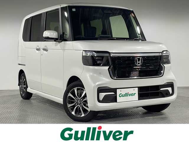 ホンダ Ｎ ＢＯＸ カスタム 神奈川県 2025(令7)年 0.1万km プラチナホワイトパール 純正ディスプレイオーディオ/(Bluetooth　USB　HDMI　AｐｐleCarPlay AndroidAuto AM FM)/片側パワースライドドア/バックカメラ/ホンダセンシング/衝突軽減ブレーキ/レーンキープアシスト/レーダークルーズコントロール/電子パーキング/オートホールドブレーキ/前席シートヒーター/LEDオートライト/スマートキー/スペアキー1本/純正14インチAW