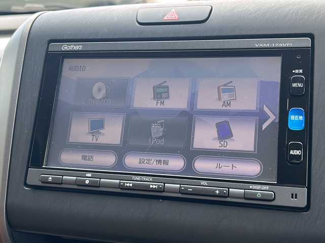 ホンダ フリード ハイブリット G ホンダセンシング 静岡県 2017(平29)年 5.4万km プレミアムディープロッソパール 純正SDナビ/・CD/・DVD/・フルセグＴＶ/・Bluetooth/・USB/・AM/・FM/主要装備/・両側パワスラ/・ホンダセンシング/・衝突軽減/・レーンキープ/・追従クルコン/・バックカメラ/・ETC/・ドラレコ前/・純正フロアマット/・LEDヘッドライト/・オートライト/・ステアリングスイッチ/・スマートキー/・プッシュスタート/・フェイクレザーシートカバー/・スペアキー1本