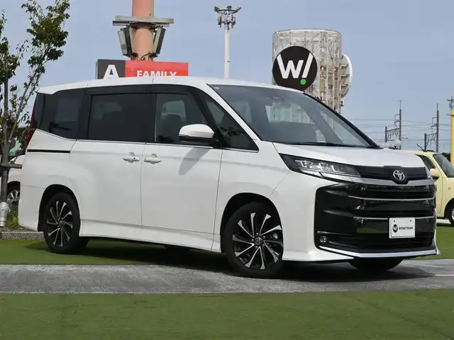 トヨタ ノア S－Z 千葉県 2024(令6)年 0.4万km ホワイトパールクリスタルシャイン Toyota Safety Sense/・プリクラッシュセーフティ/・レーンディパーチャーアラート/・オートハイビーム/・レーダークルーズコントロール/パワーバックドア/両側パワースライドドア/10.5インチ純正コネクティッドナビ/地デジTV/【DVD/CD再生機能　Bluetooth接続】/バックカメラ/ドライブレコーダー（前後撮影）【TZ-DR210】/ハーフレザーシート/前席シートヒーター/後席オットマン/革巻きステアリング/ステアリングスイッチ/ETC（2.0）/LEDヘッドライト/フォグライト/ウインカーミラー/クリアランスソナー/純正17インチアルミホイル/サイド/カーテンエアバッグ/スマートキー