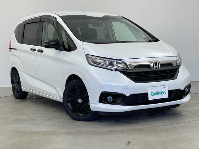 ホンダ フリード ハイブリット G ブラックスタイル 新潟県 2022(令4)年 6.8万km プラチナホワイトパール 9インチ純正メモリナビ/　フルセグTV/Bluetooth/CD/DVD/USB/HDMI/衝突被害軽減ブレーキ/レーンキープアシスト/レーダークルーズコントロール/コーナーセンサー/フリップダウンモニター/前後ドライブレコーダー【DRH-224SD】/前席シートヒーター/バックモニター/ビルトインETC/ステアリングスイッチ
