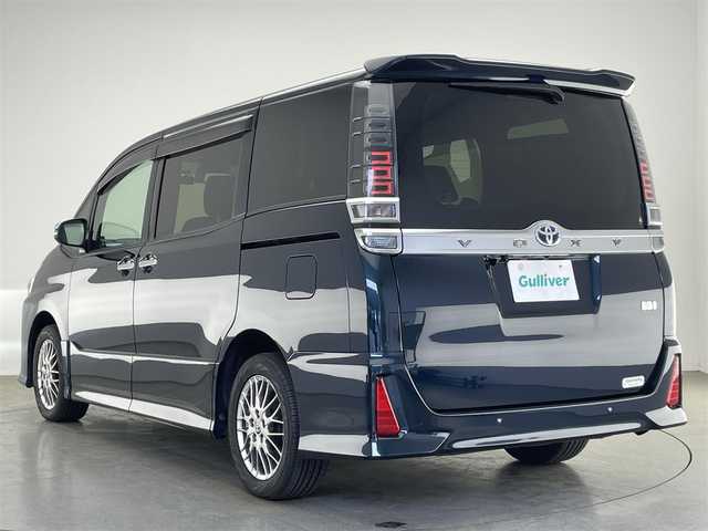 トヨタ ヴォクシー ハイブリッド ZS 煌Ⅲ 愛知県 2022(令4)年 3.5万km ブラッキッシュアゲハガラスフレーク 純正９型ナビ　フルセグＴＶ　Ｂｌｕｅｔｏｏｔｈ　バックカメラ　シートヒーター　ハーフレザー　両側パワスラドア　セーフティセンス　衝突軽減　クルコン　車線逸脱　ＬＥＤライト　フォグ　コーナーセンサ　禁煙
