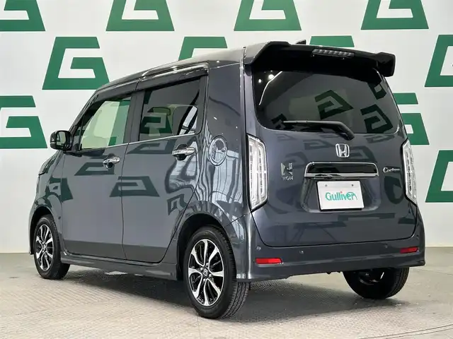ホンダ Ｎ ＷＧＮ カスタム L 鹿児島県 2024(令6)年 0.1万km メテオロイドグレーメタリック ワンオーナー/純正ナビ/(フルセグ/BluetootAM/FM)/純正前方ドライブレコーダー/ETC/バックカメラ/前席シートヒーター/ホンダセンシング/　・衝突被害軽減ブレーキ/　・先行車発進お知らせ機能/　・歩行者事故低減ブレーキ/　・路外逸脱抑制機能/　・標識認識機能/　・オートハイビーム/　・渋滞追従機能付アダプティブクルーズコントロール/　・車線維持支援システム/　・誤発進抑制機能/電動パーキングブレーキ/オートブレーキホールド/本革巻きステアリング/ステアリングリモコン/純正アルミホイール/純正フロアマット/ドアバイザー/LEDフォグランプ