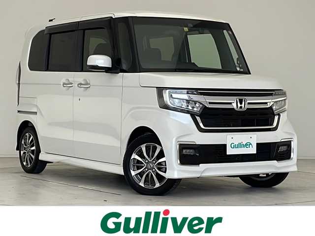 ホンダ Ｎ ＢＯＸ カスタム L 愛知県 2022(令4)年 1.5万km プラチナホワイトパール ホンダセンシング/衝突被害軽減ブレーキ/純正7インチディスプレイオーディオ/片側パワースライドドア/レーダークルーズコントロール/シートヒーター/ワンセグTV/CD DVD/Bluetooth/バックカメラ/コーナーセンサー/純正アルミホイール/LEDヘッドライト/オートマチックハイビーム/ドライブレコーダー/ETC/ステアリングスイッチ/スマートキー/プッシュスタート