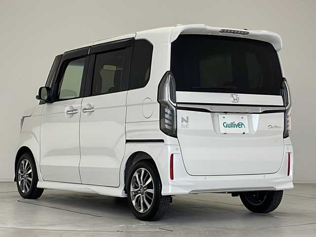 ホンダ Ｎ ＢＯＸ カスタム L 愛知県 2022(令4)年 1.5万km プラチナホワイトパール ホンダセンシング/衝突被害軽減ブレーキ/純正7インチディスプレイオーディオ/片側パワースライドドア/レーダークルーズコントロール/シートヒーター/ワンセグTV/CD DVD/Bluetooth/バックカメラ/コーナーセンサー/純正アルミホイール/LEDヘッドライト/オートマチックハイビーム/ドライブレコーダー/ETC/ステアリングスイッチ/スマートキー/プッシュスタート