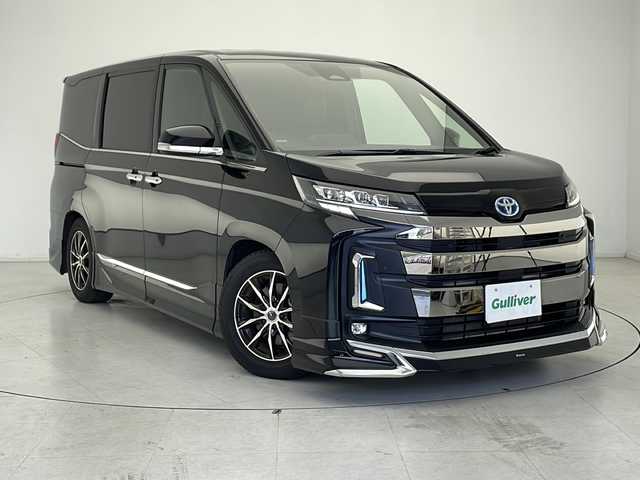 トヨタ ノア ハイブリッド S－Z 千葉県 2023(令5)年 2.6万km アティチュードブラックマイカ 純正ディスプレイオーディオ/バックカメラ/両側パワースライドドア/モデリスタフルエアロ/レーダークルーズコントロール/プリクラッシュセーフティ/レーンキープアシスト/オートハイビーム/シートヒーター/ETC/ローダウン