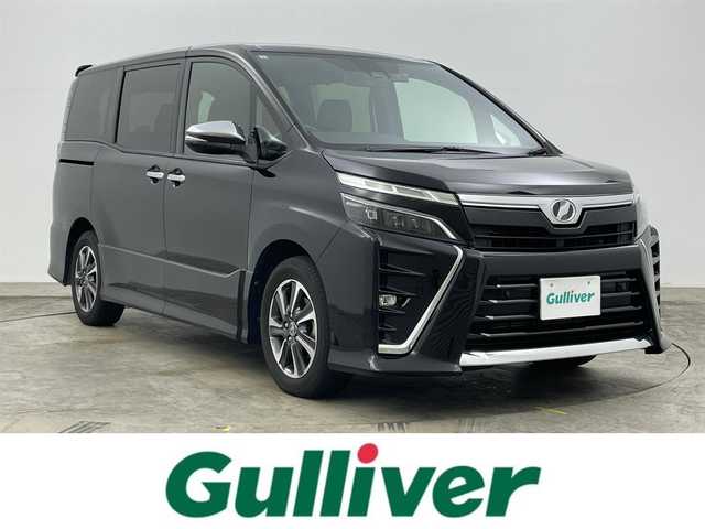 トヨタ ヴォクシー ZS 煌Ⅱ 岡山県 2019(令1)年 9.4万km ブラック アルパイン１１インチナビ/【Bluetooth/フルセグTV/Carplay/CD/DVD】/１２．８インチフリップダウンモニター/両側電動スライドドア/クルーズコントロール/ＬＥＤヘッドライト/オートハイビーム/社外ドライブレコーダー（前）/バックカメラ/衝突軽減ブレーキシステム/ビルトインＥＴＣ/純正フロアマット/後席サンシェイド
