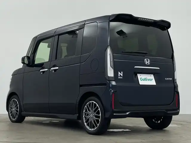 ホンダ Ｎ ＢＯＸ カスタム ターボ 鹿児島県 2023(令5)年 2.6万km ミッドナイトブルービームM 純正9インチナビ/（AM/FM/CD/DVD/AppleCarPlay）/全周囲カメラ/パドルシフト/両側パワースライドドア/シートヒーター/ハーフレザーシート/オートブレーキホールド/ホンダセンシング/レーダークルーズコントロール/レーンキープアシスト/オートハイビーム/オートライト/スマートキー/コーナーセンサー/LEDヘッドライト/純正フロアマット