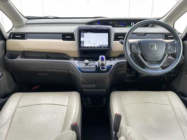 ホンダ フリード ハイブリット G ホンダセンシング 福井県 2018(平30)年 5.1万km ホワイトオーキッドパール 外部検査実施済み/純正メモリナビ＆フルセグＴＶ【VXM-187VFNi】/　（ＤＶＤ＆ＣＤ＆ＭＳＶ＆ＢＴ＆ＵＳＢ）/フリップダウンモニター/バックカメラ/ビルトインＥＴＣ/前方ドライブレコーダー/衝突軽減ブレーキ/レーンアシスト/レーダークルーズコントロール/先行車発進告知/標識認識機能/アイドリングストップ/革調シートカバー/両側パワースライドドア/オートライト/ＬＥＤライト/電動格納ミラー/スマートキー/プッシュスタート/Ｗエアバッグ/横滑り防止装置/盗難防止装置/ＡＢＳ/ドアバイザー/フロアマット/新車保証書/取扱説明書/スマートスペアキー有