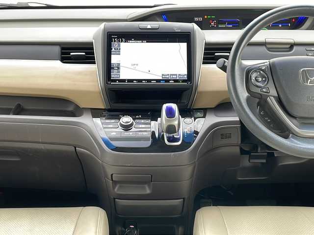 ホンダ フリード ハイブリット G ホンダセンシング 福井県 2018(平30)年 5.1万km ホワイトオーキッドパール 外部検査実施済み/純正メモリナビ＆フルセグＴＶ【VXM-187VFNi】/　（ＤＶＤ＆ＣＤ＆ＭＳＶ＆ＢＴ＆ＵＳＢ）/フリップダウンモニター/バックカメラ/ビルトインＥＴＣ/前方ドライブレコーダー/衝突軽減ブレーキ/レーンアシスト/レーダークルーズコントロール/先行車発進告知/標識認識機能/アイドリングストップ/革調シートカバー/両側パワースライドドア/オートライト/ＬＥＤライト/電動格納ミラー/スマートキー/プッシュスタート/Ｗエアバッグ/横滑り防止装置/盗難防止装置/ＡＢＳ/ドアバイザー/フロアマット/新車保証書/取扱説明書/スマートスペアキー有