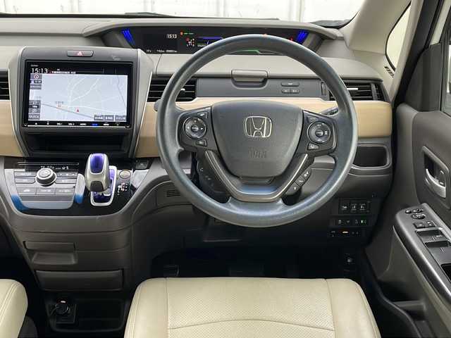 ホンダ フリード ハイブリット G ホンダセンシング 福井県 2018(平30)年 5.1万km ホワイトオーキッドパール 外部検査実施済み/純正メモリナビ＆フルセグＴＶ【VXM-187VFNi】/　（ＤＶＤ＆ＣＤ＆ＭＳＶ＆ＢＴ＆ＵＳＢ）/フリップダウンモニター/バックカメラ/ビルトインＥＴＣ/前方ドライブレコーダー/衝突軽減ブレーキ/レーンアシスト/レーダークルーズコントロール/先行車発進告知/標識認識機能/アイドリングストップ/革調シートカバー/両側パワースライドドア/オートライト/ＬＥＤライト/電動格納ミラー/スマートキー/プッシュスタート/Ｗエアバッグ/横滑り防止装置/盗難防止装置/ＡＢＳ/ドアバイザー/フロアマット/新車保証書/取扱説明書/スマートスペアキー有