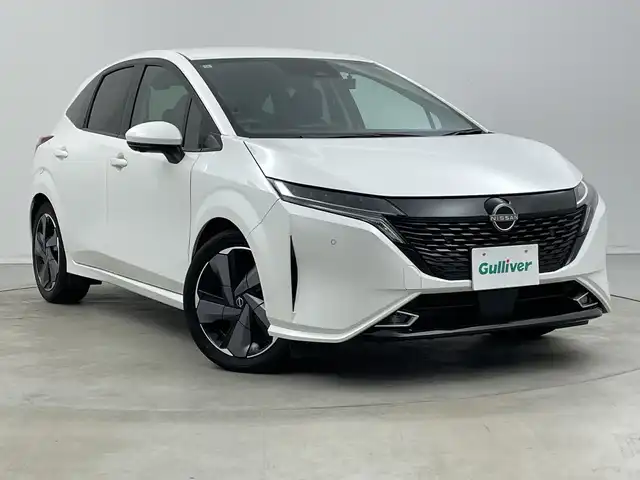 日産 オーラ G 新潟県 2022(令4)年 3.5万km ピュアホワイトパール KENWOODメモリナビ【MDV-D308BT】/　Bluetooth/CD/DVD/USB/衝突被害軽減ブレーキ/レーンキープアシスト/ブラインドスポットモニター/アラウンドビューモニター/インテリジェントルームミラー/ドライブレコーダー/ハーフレザーシート/前後コーナーセンサー/オートマチックハイビーム/ビルトインETC/横滑り防止装置/LEDヘッドライト/レザーステアリング