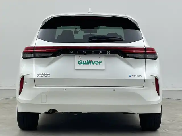 日産 オーラ G 新潟県 2022(令4)年 3.5万km ピュアホワイトパール KENWOODメモリナビ【MDV-D308BT】/　Bluetooth/CD/DVD/USB/衝突被害軽減ブレーキ/レーンキープアシスト/ブラインドスポットモニター/アラウンドビューモニター/インテリジェントルームミラー/ドライブレコーダー/ハーフレザーシート/前後コーナーセンサー/オートマチックハイビーム/ビルトインETC/横滑り防止装置/LEDヘッドライト/レザーステアリング