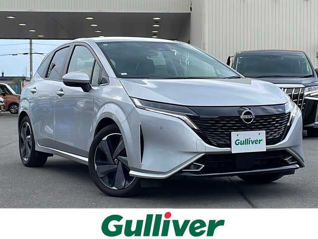 日産 オーラ G FOUR レザーエディション 道北・旭川 2024(令6)年 0.1万km ブリリアントシルバー アラウンドビューモニター/インテリジェントルームミラー/エマージェンシーブレーキ/車線逸脱警報/アダプティブヘッドライト/シートヒーター/ステアリングヒーター/スマートキー/ステアリングスイッチ