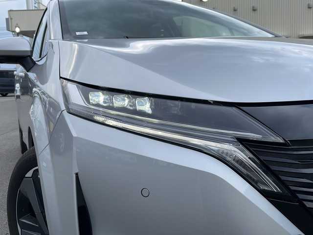 日産 オーラ G FOUR レザーエディション 道北・旭川 2024(令6)年 0.1万km ブリリアントシルバー アラウンドビューモニター/インテリジェントルームミラー/エマージェンシーブレーキ/車線逸脱警報/アダプティブヘッドライト/シートヒーター/ステアリングヒーター/スマートキー/ステアリングスイッチ