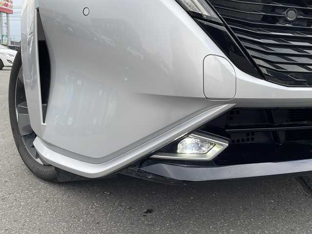 日産 オーラ G FOUR レザーエディション 道北・旭川 2024(令6)年 0.1万km ブリリアントシルバー アラウンドビューモニター/インテリジェントルームミラー/エマージェンシーブレーキ/車線逸脱警報/アダプティブヘッドライト/シートヒーター/ステアリングヒーター/スマートキー/ステアリングスイッチ