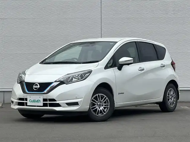 日産 ノート e－パワー X FOUR 秋田県 2018(平30)年 4.8万km ブリリアントホワイトパール 純正ナビ/衝突軽減システム/４WD/スマートキー/バックカメラ/コーナーセンサー/クルーズコントロール/アイドリングストップ/レーンキープアシスト/プッシュスタート/社外アルミ/純正フロアマット/純正ドアバイザー/ステアリングスイッチ/横滑り防止/オートエアコン/オートライト/パワーウィンドウ/パワーステアリング/電動格納ウィンカーミラー