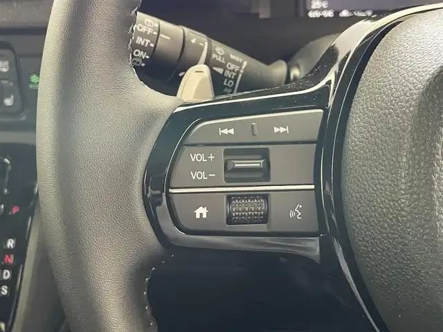 ホンダ Ｎ ＢＯＸ カスタム ターボ 愛知県 2025(令7)年 0.1万km プラチナホワイトパール 純正９型ナビ　フルセグＴＶ　カープレイ対応　全方位カメラ　ハーフレザー　シートヒーター　両側パワースライドドア　ホンダセンシング　衝突軽減　追従クルコン　ＬＥＤオートライト　コーナーセンサー パドルシフト　USB　マルチビューカメラシステム　禁煙車