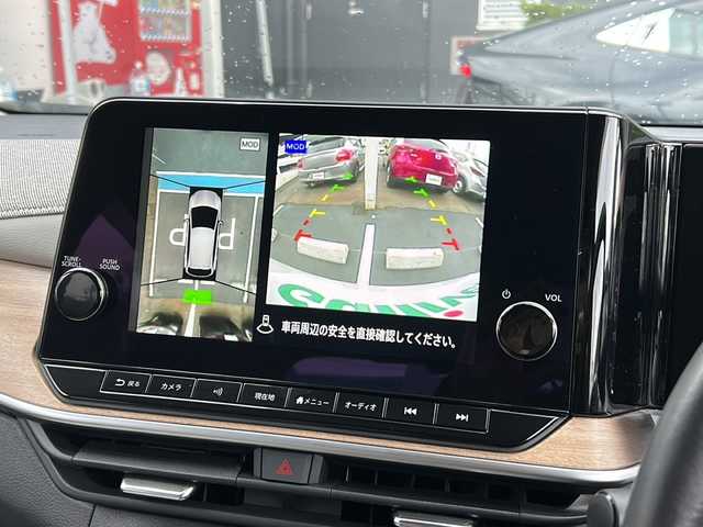 日産 オーラ G レザーエディション 広島県 2023(令5)年 0.7万km ピュアホワイトパール 禁煙/プロパイロット/ＢＯＳＥサウンド/純正ナビ/フルセグTV/Bluetooth/USB/アラウンドビューモニター/レザーシート/シートヒーター/ワイヤレス充電/ステアリングスイッチ/ステアリングヒーター/デジタルインナーミラー/ドライブレコーダー/コーナーセンサー/BSM/純正アルミホイール/純正フロアマット/純正ドアバイザー