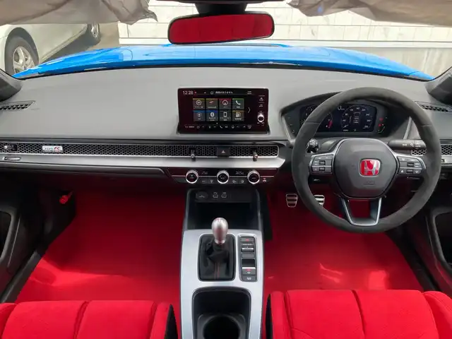 ホンダ シビック タイプR 静岡県 2025(令7)年 0.1万km未満 レーシングブルーパール ワンオーナー/Honda SENSING/9型HondaCONNECTディスプレー/   AM FM Bluetooth USB/フルセグTV/HondaLogR/バックモニター/ETC2.0/６MT/電動パーキングブレーキ/オートブレーキホールド/パーキングセンサー/後退出庫サポート/フルLEDヘッドライト/アルカンターラTypeR専用ステアリングホイール/19インチリバースリムアルミホイール/Bremboキャリパー/リアスポイラー/アルミセンターコンソールパネル/充電用USB端子/R7年5月登録/走行距離12km