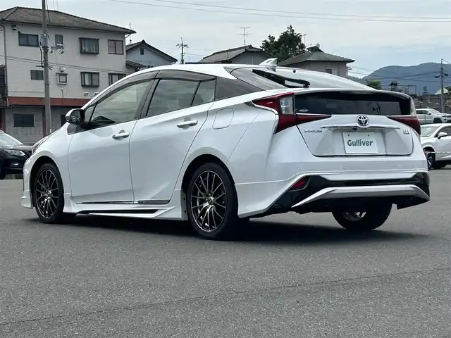 トヨタ プリウス Sツーリングセレクション 岡山県 2020(令2)年 4.5万km ホワイトパールクリスタルシャイン 純正9型ナビ　DSZT-YC4T/フルセグTV、CD、DVD、Bluetooth/AM、FM/バックカメラ/ETC/前後ドライブレコーダー/GPSレーダー　AR-G100A/AC100V/モデリスタエアロ　ICONIC STYLE/合成皮革シート/トヨタセーフティセンス/・プリクラッシュセーフティ/・レーントレーシングアシスト/・レーダークルーズコントロール/・オートマチックハイビーム/・ロードサインアシスト/先行車発進告知機能/パーキングサポートブレーキ