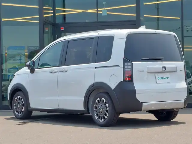 ホンダ フリード ハイブリット e:HEV クロスター 東京都 2025(令7)年 0.1万km未満 プラチナホワイトパール 登録済未使用車/純正9インチナビ/フルセグ/バックカメラ/両側パワースライドドア/シートヒーター/アダプティブクルーズコントロール/コーナーセンサー/ルーフレール/ウォークスルー/Honda SENSING/・衝突軽減ブレーキ/・車線維持支援システム/・ブラインドスポットインフォメーション/・トラフィックジャムアシスト/・オートハイビーム