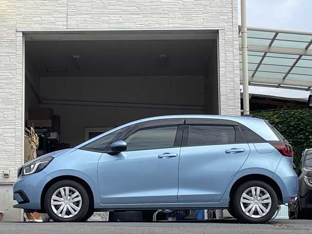 ホンダ フィット ホーム 大分県 2022(令4)年 0.7万km ライトブルー ワンオーナー /純正ナビ/純正フロアマット/純正LEDヘッドライト/オートライト/バックカメラ/横滑り防止装置/衝突被害軽減ブレーキ/クルーズコントロール/スマートキー