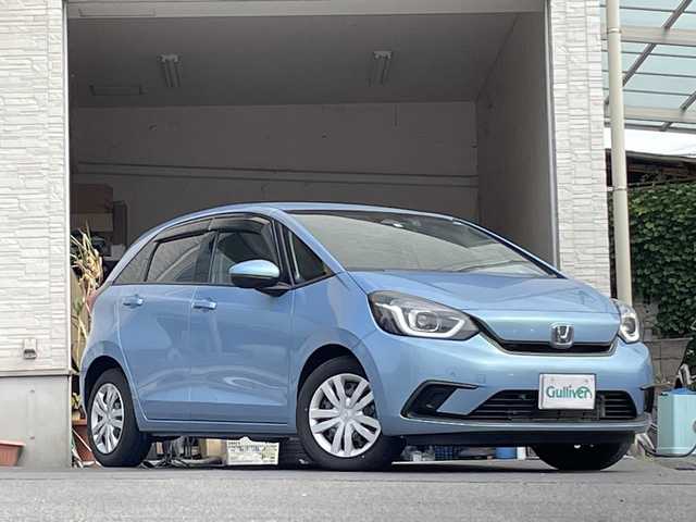 ホンダ フィット ホーム 大分県 2022(令4)年 0.7万km ライトブルー ワンオーナー /純正ナビ/純正フロアマット/純正LEDヘッドライト/オートライト/バックカメラ/横滑り防止装置/衝突被害軽減ブレーキ/クルーズコントロール/スマートキー