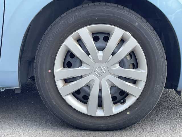 ホンダ フィット ホーム 大分県 2022(令4)年 0.7万km ライトブルー ワンオーナー /純正ナビ/純正フロアマット/純正LEDヘッドライト/オートライト/バックカメラ/横滑り防止装置/衝突被害軽減ブレーキ/クルーズコントロール/スマートキー