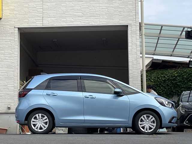 ホンダ フィット ホーム 大分県 2022(令4)年 0.7万km ライトブルー ワンオーナー /純正ナビ/純正フロアマット/純正LEDヘッドライト/オートライト/バックカメラ/横滑り防止装置/衝突被害軽減ブレーキ/クルーズコントロール/スマートキー