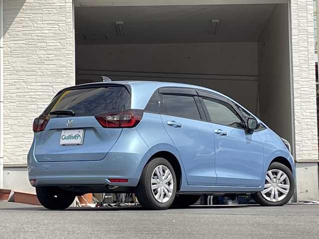 ホンダ フィット ホーム 大分県 2022(令4)年 0.7万km ライトブルー ワンオーナー /純正ナビ/純正フロアマット/純正LEDヘッドライト/オートライト/バックカメラ/横滑り防止装置/衝突被害軽減ブレーキ/クルーズコントロール/スマートキー