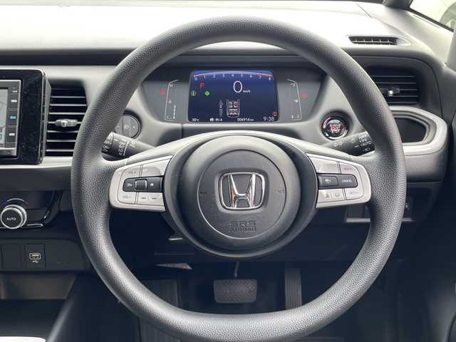 ホンダ フィット ホーム 大分県 2022(令4)年 0.7万km ライトブルー ワンオーナー /純正ナビ/純正フロアマット/純正LEDヘッドライト/オートライト/バックカメラ/横滑り防止装置/衝突被害軽減ブレーキ/クルーズコントロール/スマートキー