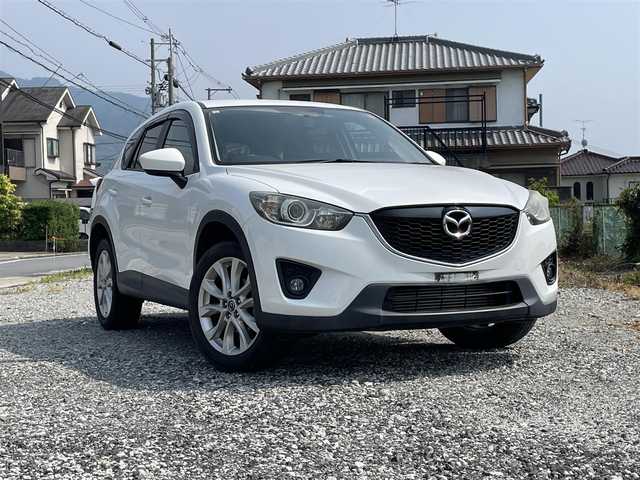 マツダ ＣＸ－５ 大阪府 2013(平25)年 6.1万km クリスタルホワイトパールマイカ 社外ナビ　フルセグ/BT/サイドカメラ/４WD/オートライト/フォグランプ/HIDライト/純正19インチAW/BOSEサウンド/アイドリングストップ/ドライブレコーダー/ETC
