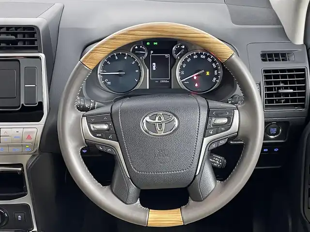 トヨタ ランドクルーザー プラド TX 道央・札幌 2021(令3)年 2.4万km ホワイトパールクリスタルシャイン ・ワンオーナー/・４WD/・寒冷地仕様/・純正SDナビ/・CD/DVD/SD/BT/フルセグTV/・TRDエアロ/・サンルーフ/・プリクラッシュセーフティ/・レーンキープアシスト/・アダプティブクルーズコントロール/・クリアランスソナー/・横滑り防止装置/・オートマチックハイビーム/・オートライト/・ベージュレザー調シートカバー/・純正17インチAW/・夏タイヤゴムのみ積込/・社外フロアマット/・プッシュスタート/・スマートキー/・スペアキー/・純正エンジンスターター/・保証書/・取扱説明書