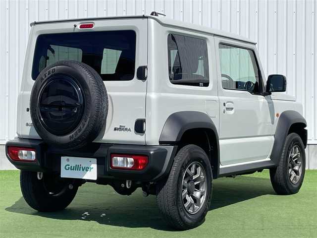 スズキ ジムニー シエラ JC 香川県 2022(令4)年 1.8万km ピュアホワイトP 登録時走行距離：17982km/４WD/純正SDナビゲーション/→フルセグTV/→CD/DVD再生/ビルトインETC/ダウンヒルアシストコントロール/ステアリングリモコン/革巻きステアリング/クルーズコントロール/シートヒーター/LEDオートライト/フォグランプ/純正15インチアルミホイール/背面タイヤ/スマートキー