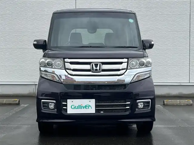 ホンダ Ｎ ＢＯＸ カスタム G ターボ Lパッケージ 山形県 2015(平27)年 8.7万km プレミアムベルベットパープル・パール ４WD/ターボ/両側パワスラ/社外ナビ/フルセグ/バックカメラ/純正アルミ/スマートキー/アイドリングストップ/プッシュスタート/クルーズコントロール/ステアリングスイッチ/前席シートヒーター/パドルシフト/ETC/純正フロアマット/社外ドアバイザー/オートライト/オートエアコン/パワーステアリング/パワーウィンドウ/横滑り防止/盗難防止装置/寒冷地仕様/電動格納ウィンカーミラー
