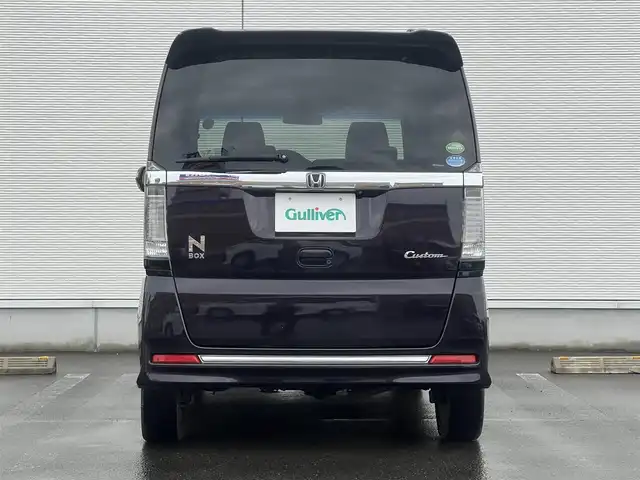 ホンダ Ｎ ＢＯＸ カスタム G ターボ Lパッケージ 山形県 2015(平27)年 8.7万km プレミアムベルベットパープル・パール ４WD/ターボ/両側パワスラ/社外ナビ/フルセグ/バックカメラ/純正アルミ/スマートキー/アイドリングストップ/プッシュスタート/クルーズコントロール/ステアリングスイッチ/前席シートヒーター/パドルシフト/ETC/純正フロアマット/社外ドアバイザー/オートライト/オートエアコン/パワーステアリング/パワーウィンドウ/横滑り防止/盗難防止装置/寒冷地仕様/電動格納ウィンカーミラー