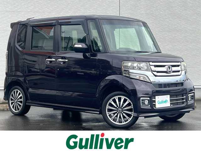 ホンダ Ｎ ＢＯＸ カスタム G ターボ Lパッケージ 山形県 2015(平27)年 8.7万km プレミアムベルベットパープル・パール ４WD/ターボ/両側パワスラ/社外ナビ/フルセグ/バックカメラ/純正アルミ/スマートキー/アイドリングストップ/プッシュスタート/クルーズコントロール/ステアリングスイッチ/前席シートヒーター/パドルシフト/ETC/純正フロアマット/社外ドアバイザー/オートライト/オートエアコン/パワーステアリング/パワーウィンドウ/横滑り防止/盗難防止装置/寒冷地仕様/電動格納ウィンカーミラー