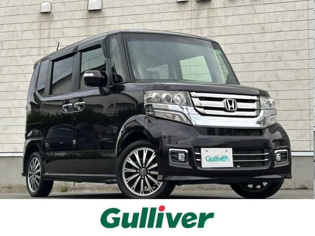 ホンダ Ｎ ＢＯＸ カスタム G ターボ Lパッケージ 山形県 2015(平27)年 8.7万km プレミアムベルベットパープル・パール 4WDターボ/両側パワースライドドア/社外ナビフルセグ/バックカメラ/純正アルミ/スマートキー/アイドリングストップ/プッシュスタート/クルーズコントロール/ステアリングスイッチ/前席シートヒーター/パドルシフト/ETC/純正フロアマット/オートライト/オートエアコン/寒冷地仕様/電動格納ウィンカーミラー