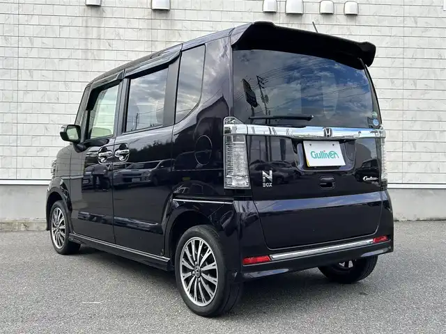 ホンダ Ｎ ＢＯＸ カスタム G ターボ Lパッケージ 山形県 2015(平27)年 8.7万km プレミアムベルベットパープル・パール 4WDターボ/両側パワースライドドア/社外ナビフルセグ/バックカメラ/純正アルミ/スマートキー/アイドリングストップ/プッシュスタート/クルーズコントロール/ステアリングスイッチ/前席シートヒーター/パドルシフト/ETC/純正フロアマット/オートライト/オートエアコン/寒冷地仕様/電動格納ウィンカーミラー