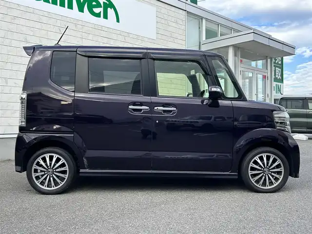 ホンダ Ｎ ＢＯＸ カスタム G ターボ Lパッケージ 山形県 2015(平27)年 8.7万km プレミアムベルベットパープル・パール 4WDターボ/両側パワースライドドア/社外ナビフルセグ/バックカメラ/純正アルミ/スマートキー/アイドリングストップ/プッシュスタート/クルーズコントロール/ステアリングスイッチ/前席シートヒーター/パドルシフト/ETC/純正フロアマット/オートライト/オートエアコン/寒冷地仕様/電動格納ウィンカーミラー