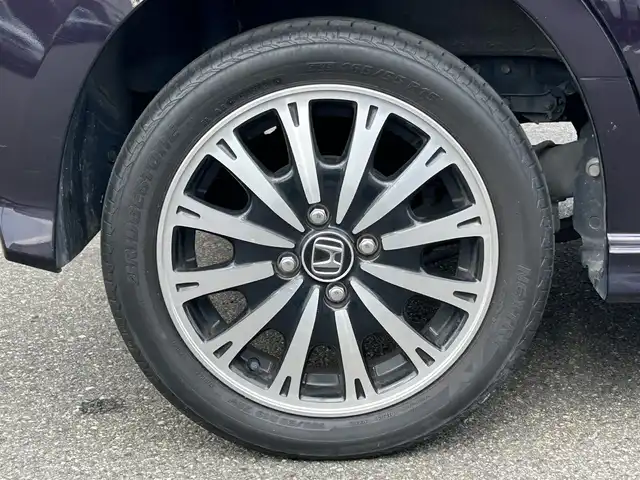 ホンダ Ｎ ＢＯＸ カスタム G ターボ Lパッケージ 山形県 2015(平27)年 8.7万km プレミアムベルベットパープル・パール 4WDターボ/両側パワースライドドア/社外ナビフルセグ/バックカメラ/純正アルミ/スマートキー/アイドリングストップ/プッシュスタート/クルーズコントロール/ステアリングスイッチ/前席シートヒーター/パドルシフト/ETC/純正フロアマット/オートライト/オートエアコン/寒冷地仕様/電動格納ウィンカーミラー