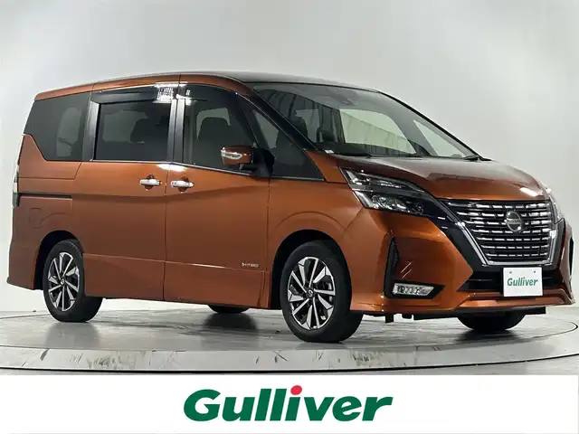 日産 セレナ ハイウェイスター V 佐賀県 2022(令4)年 0.7万km オレンジ 純正10インチナビ/社外フリップダウンモニター/バックカメラ/福祉車両/助手席スライドアップシート/車椅子収納装置/衝突被害軽減システム/プロパイロット/レーンアシスト/レーダークルーズコントロール/ロードサインアシスト/オートライト/オートマチックハイビーム/LEDヘッドライト/LEDフォグライト/電子パーキング/オートブレーキホールド/前方ドライブレコーダー/ビルトインETC/両側パワースライドドア/ハンズフリースライドドア/ステアリングヒーター/運転席シートヒーター/後席サンシェード/シートバックテーブル/ISOFIX対応/純正フロアマット/純正16インチアルミホイール/ステアリングスイッチ/プッシュスタート/スマートキー