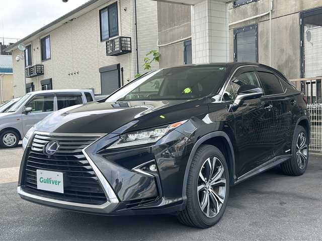 レクサス ＲＸ 450h バージョンL 京都府 2017(平29)年 10.1万km グラファイトブラックガラスフレーク 純正SDナビ/フルセグTV/Bluetooth/CD/DVD/SD/AUX/バックカメラ/サンルーフ/レーダークルーズコントロール/3眼LEDヘッドライト/BSM/HUD/ステアリングヒーター/ウッドコンビステアリング/ブレーキホールド/クリアランスソナー/茶革シート/電格ウィンカーミラー/シーケンシャルウィンカー/メモリー付きパワーシート/エアーシート/シートヒーター/ビルトインETC2.0/ドラレコ