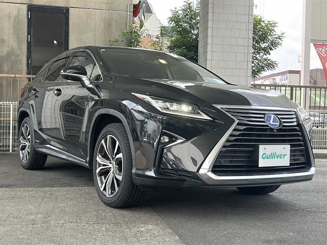 レクサス ＲＸ 450h バージョンL 京都府 2017(平29)年 10.1万km グラファイトブラックガラスフレーク 純正SDナビ/フルセグTV/Bluetooth/CD/DVD/SD/AUX/バックカメラ/サンルーフ/レーダークルーズコントロール/3眼LEDヘッドライト/BSM/HUD/ステアリングヒーター/ウッドコンビステアリング/ブレーキホールド/クリアランスソナー/茶革シート/電格ウィンカーミラー/シーケンシャルウィンカー/メモリー付きパワーシート/エアーシート/シートヒーター/ビルトインETC2.0/ドラレコ