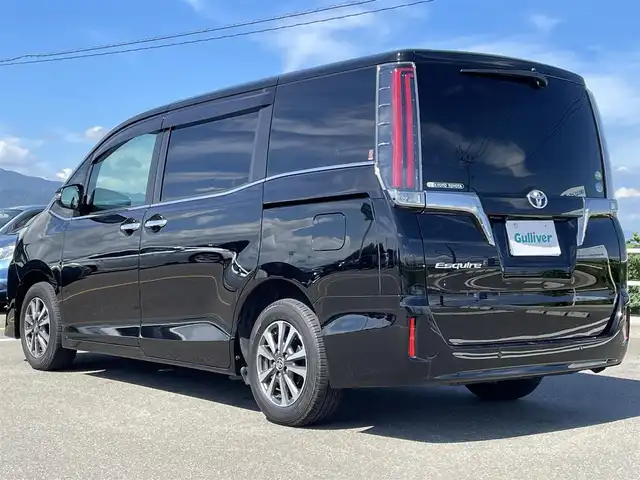 トヨタ エスクァイア Gi プレミアムパッケージ ブラックテーラード 佐賀県 2020(令2)年 3.1万km ブラック 純正9インチSDナビゲーション/・フルセグTV/CD/DVD/SD/Bluetooth/純正フリップダウンモニター/バックカメラ/前方ドライブレコーダー/ビルトインETC/デジタルインナーミラー/両側パワースライドドア/後席エアコン/ハーフレザーシート/DN席シートヒーター/キャプテンシート/ISOFIX対応/革巻きステアリング/ステアリングヒーター/ステアリングリモコン/純正15インチアルミホイール/純正LEDヘッドライト/・オートマチックハイビーム/純正LEDフォグランプ/純正フロアマット/純正ドアバイザ―/新車保証書/トヨタセーフティセンス/・クルーズコントロール/・プリクラッシュセーフティ/・クリアランスソナー/・先行車発進お知らせ機能/・レーンディパーチャーアラート