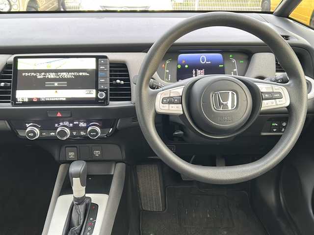 ホンダ フィット e:HEVクロスター 茨城県 2021(令3)年 3.7万km クリスタルブラックパール ワンオーナー/純正ナビ/　　【フルセグ、BT、CD、DVD】/バックカメラ/ホンダセンシング/路外逸脱抑制機能/衝突防止装置/レーンアシスト/横滑り防止装置/コーナーセンサー/アダプティブクルーズコントロール/純正16インチAW/LEDオートライト/純正フロアマット/ETC/スマートキー/プッシュスタート