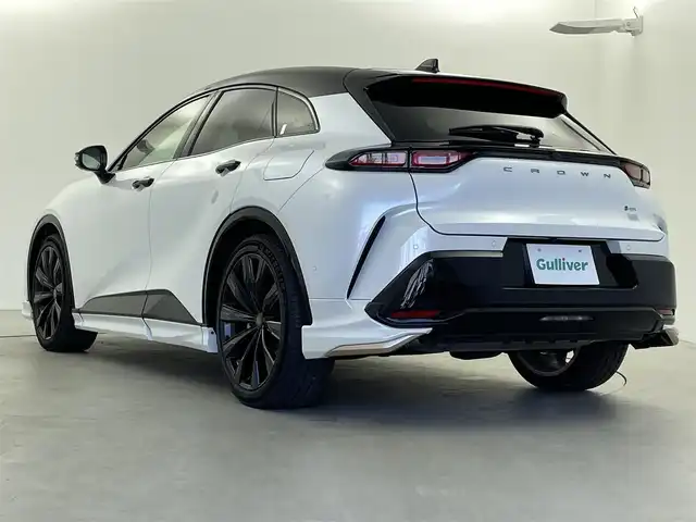 トヨタ クラウン スポーツ Z 福井県 2023(令5)年 2万km パールⅡ モデリスタエアロ /12.3インチディスプレイオーディオ（コネクティッドナビ対応）/ナビ/Bluetooth/Miracat/ITS Connect/トヨタチームメイト/・アドバンスドパーク/・パーキングサポートブレーキ（周囲静止物）/・アドバンスドドライブ（渋滞時支援）/デジタルインナーミラー/全周囲モニター/革シート/シートベンチレーション/シートヒーター/パワーシート/Toyota Safety Sense/・プリクラッシュセーフティ/・緊急時操舵支援（アクティブ操舵機能付）/・フロントトラフィックアラート/・レーンチェンジアシスト/・レーントレーシングアシスト/・レーンディパーチャーアラート/・レーダークルーズコントロール（全車速追従機能付）/・アクティブハイビームシステム/・ロードサインアシスト/・ドライバー異常時対応システム/・プロアクティブドライビングアシスト/・発進遅れ告知機能/ブラインドスポットモニター/安心降車アシスト/パーキングサポートブレーキ（前後）/ヘッドアップディスプレイ/ビルトインETC2.0/純正21インチAW