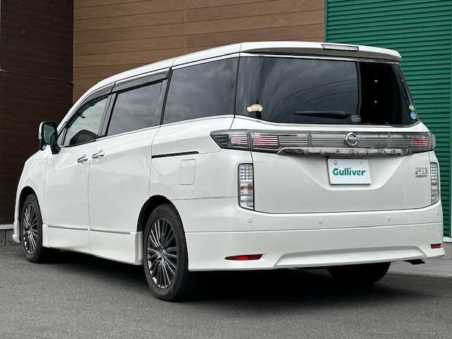 日産 エルグランド 250HWS プレミアム アーバンクロム 静岡県 2019(平31)年 7.3万km ブリリアントホワイトパール ワンオーナー/純正ナビ（フルセグTV、Bluetooth/後席モニター/前席パワーシート/レザーシート/両側パワースライドドア/オットマン/パワーバックドア/車外カメラ（バック/シートヒーター/ETC/純正アルミホイール/プッシュスタート/コーナーセンサー/ウォークスルー